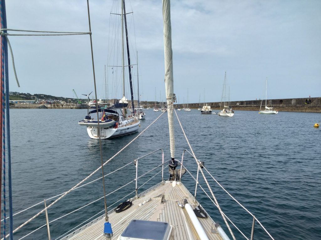 Looking towards Braye, Alderney from the deck of SV WeatherWitch with all the other mooring buoys also occupied.
