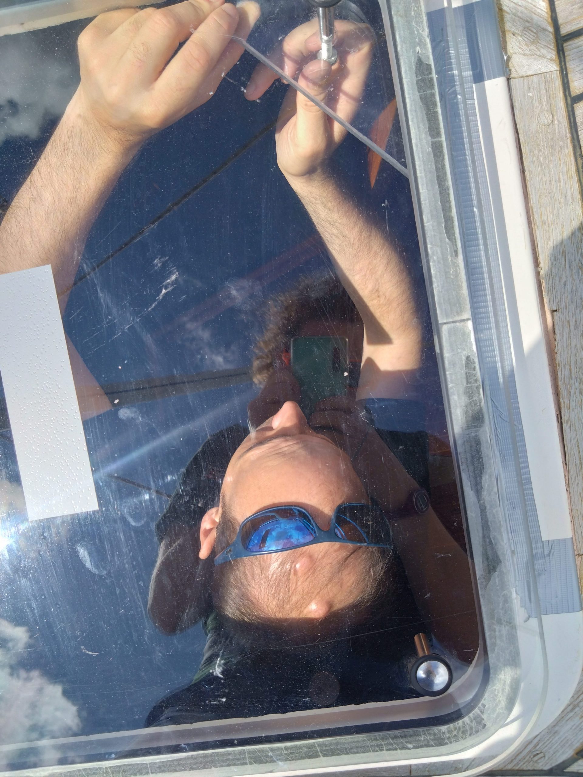 Mike fitting the temporary hatch lid