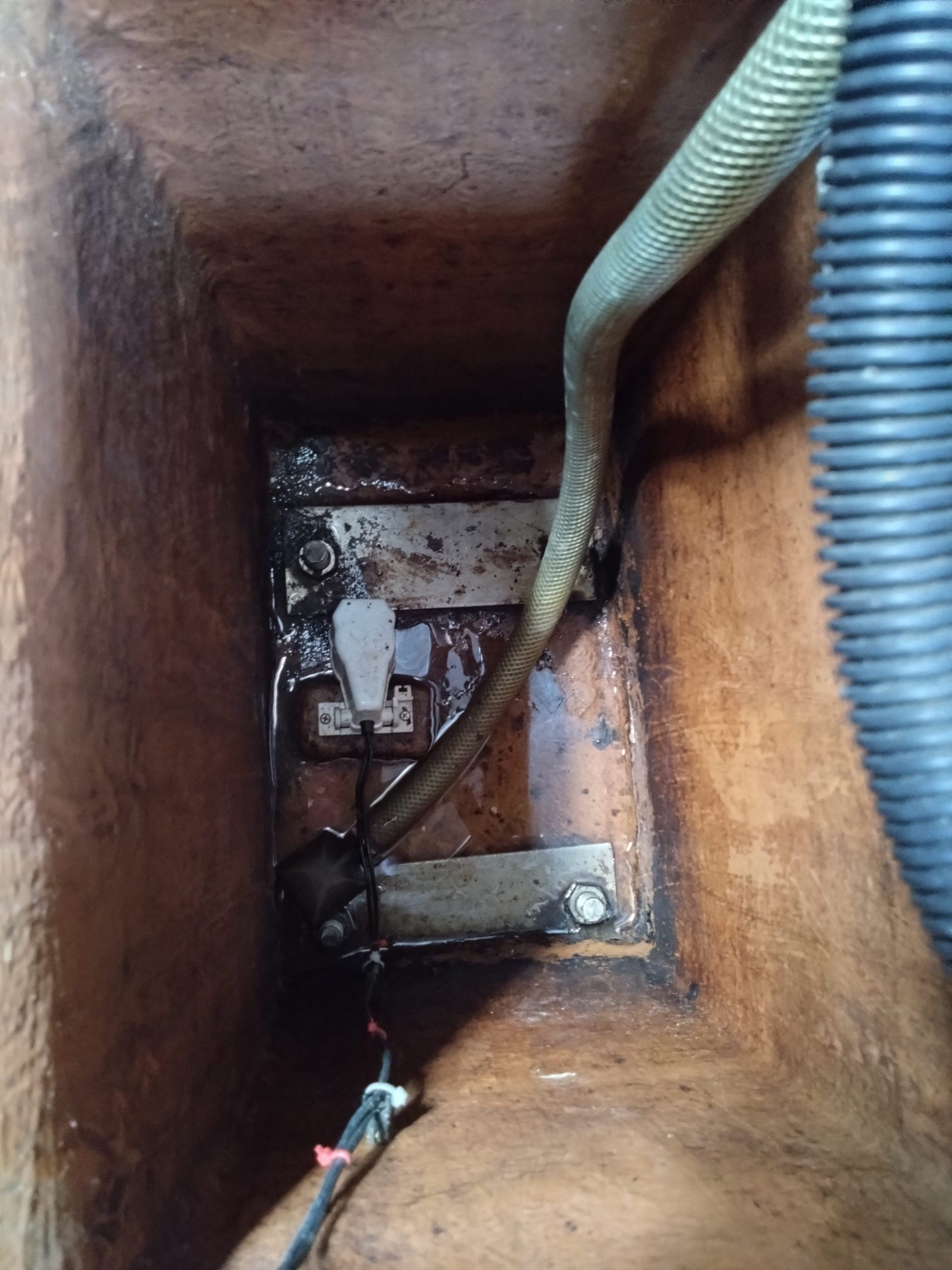 WeatherWitch's deep bilge with automatic bilge pump float switch and pump out pipework